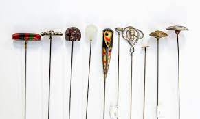 Hat Pins A Collection Of Hat Pins Including A Silver Charles Horner Scrolling Version A Silver And Plique A Jour Enamel Pin Along With Plastic Enamel And Paste Set Versions 10