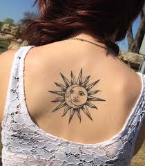 The sun and the moon are like the yin and yang of the heavens. Sun And Moon Tattoo Design On Back For Females Design Females Moon Sun Tattoo Tattoos Frauen Tattoo Mond Weibliche Rucken Tattoos