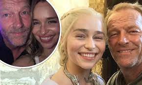 In clarke's photo, momoa is literally sweeping the mother of dragons off her feet. Emilia Clarke Shares Throwback Pics Of Her And Iain Glen While Welcoming Him To Instagram Daily Mail Online