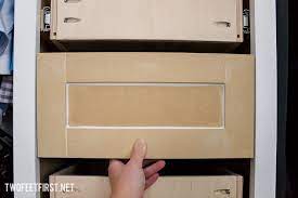 Now that the drawer front is painted and the hardware holes are drilled, it's time to install it onto the existing drawer. How To Build Quick And Easy Shaker Drawer Fronts Diy Tutorial