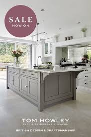 Our clients have chosen to mix the colours with a cool partridge grey on the tall bank of units and a contemporary dark charcoal for the island. Shaker Kitchens Traditional Contemporary Kitchens Tom Howley In 2020 Contemporary Grey Kitchen Grey Kitchen Designs Grey Kitchen Island