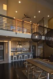 This is a wooden loft staircase design which has a side ladder and has desks below the steps of the staircase. Loft Decorating Ideas Five Things To Consider