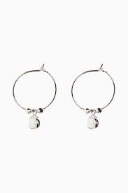 Sterling silver very tiny pair of mismatched asymmetric moon and star stud earrings, cute and quirky jewellery, textured finish. Buy Opal Charm Hoop Earrings From Next Australia