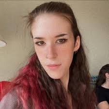 Can someone run plate WA CPL2067 for a red dodge minivan parked in a  suspicious spot in Parkland, WA?