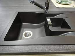 You may also want to plunge the drain a few times to further loosen any. How To Clean Black Kitchen Sinks Home Quicks