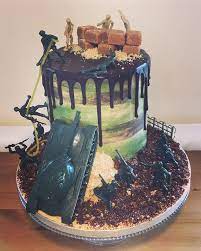 Chocolate cake with vanilla buttercream icing, topped with a chocolate army helmet cake covered in cammo colored fondant and accented with fondant dog tags bearing the birthday boy's name! Making This Cake Definitely Brought Out The Inner Kid In Me So Much Fun Details My Favourite Chocolate Sponge Fill Army Birthday Cakes Cake Army S Birthday