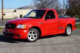 Image result for Brilliant Red 1999 Truck