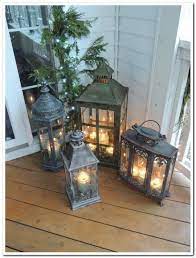 34 Ideas For Decorating A Small Front Porch For Fall Porch Lanterns Front Porch Decorating Front Porch Christmas Decor