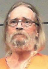 Man charged after troopers find guns and marijuana in Bridgeport home