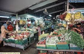 A market in a traditional malay kampong house: Geylang Serai Market Vegetable Stalls