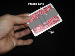 Cut the plastic to the exact length of the card, then use magician's wax to stick it onto the card in the middle. Easy Magic Trick How To Levitate Or Float A Playing Card Version Three Preparing The Gimmick Zaubertrick Spielkarten Zauber