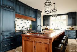 If you want the piece to look like it's been painted before, you'll want to buy two colors of paint so the base color shows through when the top player is distressed. Navy Kitchen Cabinet Paint Color Home Bunch Interior Design Ideas