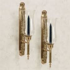 Hurricane wall sconces will protect your candle flames from drafts, whether you hang your sconces in the entryway or on your bedroom walls. Hurricane Wall Sconces With Glass Globes Touch Of Class
