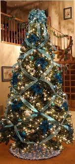 Maybe you would like to learn more about one of these? Gorgeous Christmas Tree In Teal And Gold With Poinsettias White Christmas Tree Decorations Amazing Christmas Trees Beautiful Christmas Trees Decorated