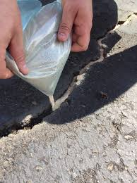 How to repair and seal an asphalt driveway (video). How To Fill Driveway Cracks The Diy Doghouse