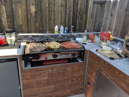 You can turn your space into the ultimate entertaining space with built in grills, beverage tubs and pizza ovens. Diy Outdoor Bbq Using Camp Chef Grill Outdoor Kitchen Diy Outdoor Kitchen Backyard Kitchen