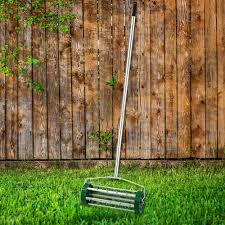 Choose a sturdy rake with slightly curved tines that can bring loosened thatch to the surface (these are occasionally sold as dethatching rakes). Amazon Com Thebestshop99 Rolling Lawn Aerator Heavy Duty Grass Cutter Roller Spike Garden Scarifier Yard Tool Push Manual Machine Hand Garden Outdoor