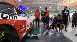 Team members that work in the pits and on the cars during the races themselves. College Athletes Tested In Drive For Diversity Pit Crew Combine Nascar Com