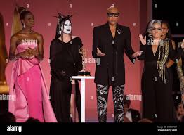 Symone, from left, Gottmik, RuPaul, and Michelle Visage accept the award  for outstanding competition program for "RuPaul's Drag Race" at the 73rd  Emmy Awards