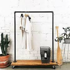 Metal pipe rolling rack gold, rose gold, silver, black shopandislist 5 out of 5 stars (120) $ 340.00 free shipping add to favorites quick view rose gold table top iron rack shopwithchioms 4.5 out of 5 stars (17) $ 30.19. Industrial Pipe Clothing Rack 63in Garment Racks Clothing Retail Display Rack Gold Metal Ballet Dress Racks Vintage Commercial Rolling Rack On Wheels Home Clothing Closet Storage Urbytus Com