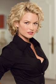 Nip and Tuck Actress. I always loved her hair style. Just not brave enough  to cut my hair that short.