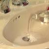Place the cup over the drain. 1