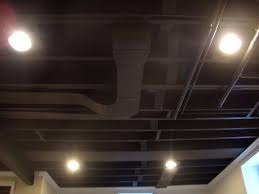 I spray painted the ceiling (floor joists and subfloor) of the unfinished basement of our 1925 house about six months ago. Appropriate Benjamin Moore Flat Paint For Exposed Basement Ceiling