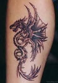 Excuse the glare, strong light. 33 Modern Dragon Tattoos For Leg
