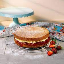 Transfer to a rack to cool for 20 minutes, then run a knife around the edge to release the sides of the cake from the pan. Dexam Round Cooling Rack 30cm
