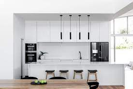 White subway tiles on the backsplash lead to contemporary flair. Black Kitchen Appliances Dark And Bold Additions For Every Kitchen