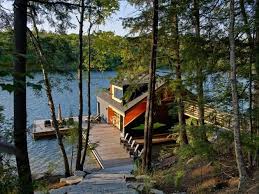 Floating Cabin With Integrated Boathouse Boathouse Design House Boat Lake House