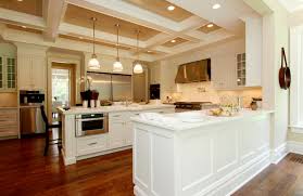 white kitchen cabinets with stainless