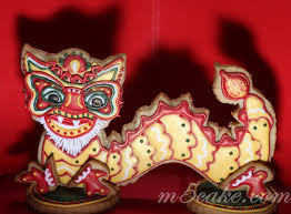 Chinese Year Of The Dragon Cookies Cakecentral Com This set includes green dragons with red wings and number 1's.