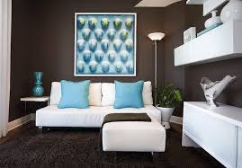 Navy blue upholstery, blue and beige draperies, beige room decor and a rich brown leather ottoman. Pin On Inspiration For Our Chocolate Turquoise Aqua Front Room