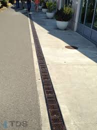 Trench Drain For Streetscapes Landscape Drainage Drainage Solutions Trench Drain Systems