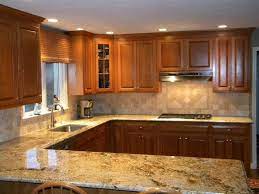 Granite And Backsplash Combinations Namibian Gold Granite Countertops W Tumble Marb Gold Granite Countertops Granite Countertops Kitchen Granite Countertops
