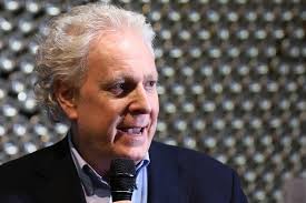 Charest urges Canada's Conservatives to avoid 'American-style' politics