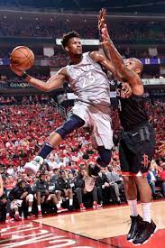 Jimmy Butler 23 Of The Minnesota Timberwolves Saves The Ball From Going Out Of Bounds As They Play Against Houston Sports Pictures Basketball Playoffs Sports