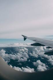 خلفية طيارة وغيوم in 2021 travel aesthetic airplane view trip
