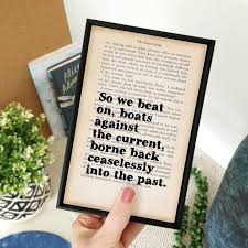 It eluded us then, but that's no matter — tomorrow we will run faster, stretch out our arms farther. Great Gatsby So We Beat On Boats Against The Current Quote Print Bookishly