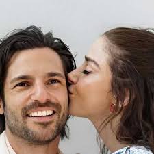 Mer: 'I nearly kissed the Italian one. I may kiss the other one, too.  Because, I mean, look at him. I don't know if I'll ever find love again,  but I'm happier