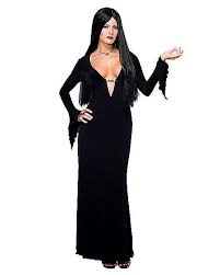 If you're looking for a costume for the whole gang, addams family halloween costumes make for an epic group halloween look so start practicing your snaps! Morticia Addams Adult Plus Size Costume Spirithalloween Com
