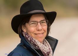 Rufous Hummingbird or possibly an Allen's Hummingbird...this hummingbird  continues to visit my feeders. I think this video shows the rufous color  better than the pictures that I posted earlier. I included some