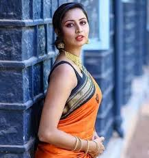 Use large size curling rod to get loose curls like this, use a setting spray to keep the hairstyle in place. Saree Hairstyles 50 Stylish Hairstyles To Try On Sarees 2021