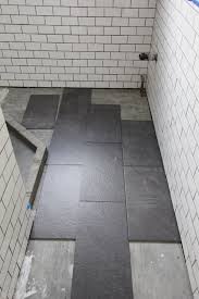 I'm back with an update on our basement laundry room. What S The Best Tile Layout For My Bathroom Straight Or Staggered Apartment Therapy