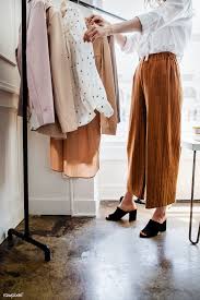 Download Premium Image Of Young Female Designer In A Boutique 1221100 In 2020 Clothing Photography Shopping Photography Business Women Fashion