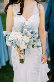 Bridesmaids in long blue dresses at. 22 Beautiful Bouquets That Can Double As Your Something Blue Martha Stewart