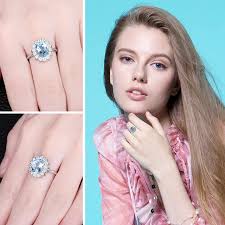 JewelryPalace Princess Diana 2.3ct Natural Blue Topaz 925 Sterling Silver Halo Engagement Ring Women