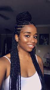 Braided Bun And Box Braids In The Back Twist Braid Hairstyles Kids Braided Hairstyles Box Braids Bun