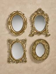 Arranged Just So The Unique Stylings Of The Antique Gold Adorabelle Accent Wall Mirror Set Create A P Wall Mirrors Set Antique Mirror Wall Mirror Wall Bedroom